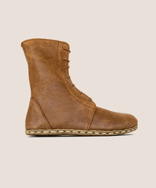 Brown earthing boot for women, waxed pull-up leather, copper rivet sole — side view